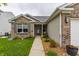 Inviting front exterior featuring a walkway leading to the front door, enhanced by well-manicured landscaping at 3872 Dusty Sands Rd, Whitestown, IN 46075