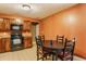 Cozy kitchen area featuring a table with chairs, appliances and plenty of cabinets at 3872 Dusty Sands Rd, Whitestown, IN 46075