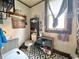 Bathroom with tile flooring, toilet, and vanity, offering a functional and cozy space at 403 N College Ave, Greencastle, IN 46135