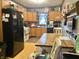 Functional kitchen with a wooden table, modern appliances, and ample cabinet storage space at 403 N College Ave, Greencastle, IN 46135