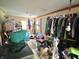 Functional laundry room with hanging racks, washer, dryer, and natural light at 403 N College Ave, Greencastle, IN 46135