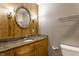 Bathroom with wood walls, granite counters, and modern fixtures at 4191 N Graham Rd, Whiteland, IN 46184