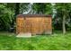 Outdoor storage shed featuring a wood facade in a lush green yard at 4191 N Graham Rd, Whiteland, IN 46184