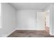 Light-filled bedroom featuring contemporary flooring, neutral walls, and a closet at 4310 Crittenden Ave, Indianapolis, IN 46205
