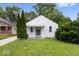 Charming home exterior with freshly cut grass, a well-kept lawn and classic design at 4310 Crittenden Ave, Indianapolis, IN 46205