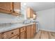 Cozy kitchen with oak cabinets, granite countertops, and modern appliances at 4310 Crittenden Ave, Indianapolis, IN 46205