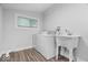 Practical laundry area with sink and washer and dryer at 4310 Crittenden Ave, Indianapolis, IN 46205