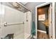 Bright bathroom with a glass-enclosed shower, decorative elements, and a fresh towel at 561 Farnham Dr, Westfield, IN 46074
