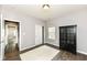 Neutral bedroom featuring a large window, modern floors, a black wood cabinet, and closet at 561 Farnham Dr, Westfield, IN 46074