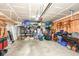 Spacious garage with ample storage, shelving, and organization, offering plenty of space at 561 Farnham Dr, Westfield, IN 46074