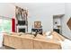Spacious living room with a fireplace and unique wall accents for a cozy and stylish gathering space at 561 Farnham Dr, Westfield, IN 46074