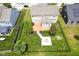 Aerial shot of the fenced backyard showing a spacious deck and fire pit area at 6471 W Clearview Dr, McCordsville, IN 46055