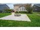 The backyard has a cozy fire pit and space for outdoor relaxation at 6471 W Clearview Dr, McCordsville, IN 46055
