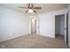 This bedroom has neutral carpet, a ceiling fan, and closet at 6471 W Clearview Dr, McCordsville, IN 46055