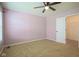 Bedroom with carpet, fan and an open closet at 6471 W Clearview Dr, McCordsville, IN 46055