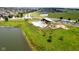 Community pool with a playground, parking and landscaping at 6471 W Clearview Dr, McCordsville, IN 46055