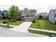 A view of the home from the street showing a well-kept lawn and curb appeal at 6471 W Clearview Dr, McCordsville, IN 46055