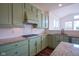 Kitchen with stainless steel appliances, custom cabinets, and granite countertops at 6471 W Clearview Dr, McCordsville, IN 46055