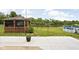 Backyard features a gazebo and partial view of the lake at 6955 Long Run Dr, Indianapolis, IN 46268