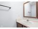 Functional bathroom with a vanity, mirror, and neutral color scheme at 6955 Long Run Dr, Indianapolis, IN 46268