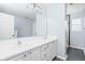 Bathroom featuring a double sink vanity with white cabinets and tile floors at 6955 Long Run Dr, Indianapolis, IN 46268