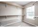 Spacious closet includes built-in shelving for ample storage solutions at 6955 Long Run Dr, Indianapolis, IN 46268
