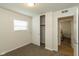 This blank bedroom is a blank canvas with a closet and entrance to another room at 717 Berkeley Dr, Shelbyville, IN 46176