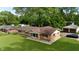 Charming brick home with a well-maintained lawn and detached garage at 771 Doran Ave, Shelbyville, IN 46176