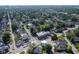 Wide aerial shot of the neighborhood, showcasing the house in its surroundings at 806 Shelby St, Indianapolis, IN 46203