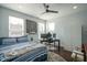 Bedroom with a ceiling fan, hardwood floors, and lots of natural light from the windows at 806 Shelby St, Indianapolis, IN 46203