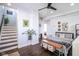 Unique bedroom with stairs, stylish decor, and a comfortable bed with a decorative throw blanket at 806 Shelby St, Indianapolis, IN 46203