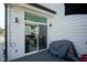 A close up view of the home's deck showing the home's sliding glass door at 806 Shelby St, Indianapolis, IN 46203