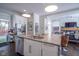 Gourmet kitchen featuring stainless steel appliances, a large island, and an open layout at 806 Shelby St, Indianapolis, IN 46203