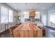 Bright kitchen with an eat-in island, updated appliances, and access to outside at 806 Shelby St, Indianapolis, IN 46203