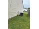 Backyard with an air conditioning unit on the side of the house at 8113 Maple Stream Ln, Indianapolis, IN 46217