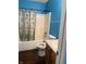 Bathroom features a bathtub/shower, a toilet, and vanity at 8113 Maple Stream Ln, Indianapolis, IN 46217