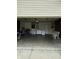 Spacious two car garage with lots of room for storage and parking at 8113 Maple Stream Ln, Indianapolis, IN 46217