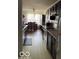 Efficient kitchen layout with ample counter space and modern appliances at 8113 Maple Stream Ln, Indianapolis, IN 46217