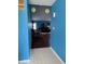 Bright living room featuring hardwood floors, comfortable seating, vaulted ceilings, and a view into another room at 8113 Maple Stream Ln, Indianapolis, IN 46217