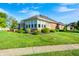 Brick ranch-style home with a well-manicured lawn and mature landscaping at 817 S Jefferson St, Brownsburg, IN 46112