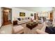 Spacious living room featuring neutral tones, comfortable furniture, and ample natural light at 817 S Jefferson St, Brownsburg, IN 46112