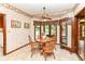 Charming breakfast nook with wood table, bay window, and views of the pool at 8534 Helmsman Cir, Indianapolis, IN 46256