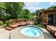 Outdoor deck featuring patio furniture and a hot tub, ideal for outdoor relaxation and entertaining at 8534 Helmsman Cir, Indianapolis, IN 46256