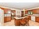 Functional kitchen featuring a center island with cooktop and breakfast bar at 8534 Helmsman Cir, Indianapolis, IN 46256