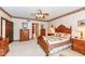 View of the main bedroom with wood furniture and a walk-in closet at 8534 Helmsman Cir, Indianapolis, IN 46256