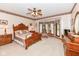 A spacious main bedroom with natural light and neutral carpet at 8534 Helmsman Cir, Indianapolis, IN 46256