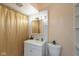 Clean bathroom featuring a vanity with storage, a mirror, and a shower with curtain at 905 Buchanan St, Indianapolis, IN 46203