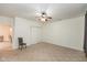 Bedroom featuring carpet, neutral walls, ceiling fan, and a closet at 905 Buchanan St, Indianapolis, IN 46203