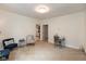 Bright living room with a desk area and comfortable seating, perfect for relaxing or working at 905 Buchanan St, Indianapolis, IN 46203