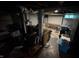 Storage basement with drop ceiling, bare walls, and storage boxes at 917 N Rural St, Indianapolis, IN 46201